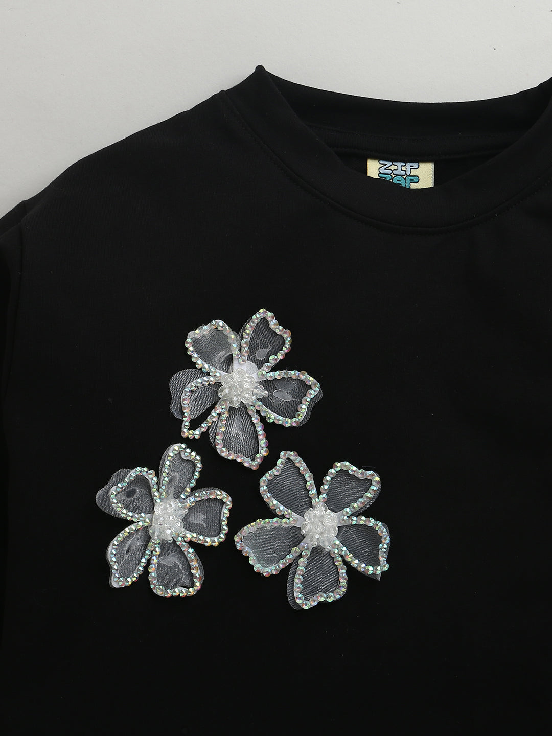 Black Festive Sweatshirt With Silver Floral Patch